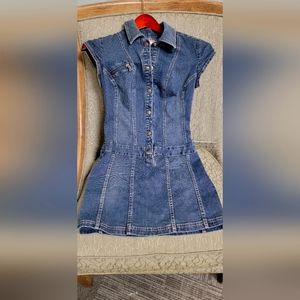 Guess Denim Mini Dress with dropped waist. Snap closures up the front.
